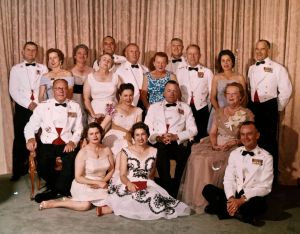 That's mom seated at bottom left, and Dad standing at upper right in 1959