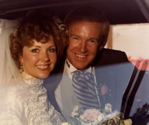 The happy couple - wearing a 1906 wedding dress and tux in 100+ degree heat!